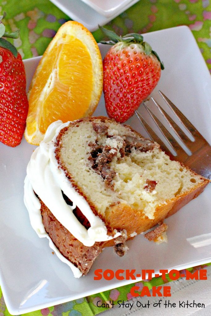 Sock-It-To-Me Cake | Can't Stay Out of the Kitchen | this fantastic #cake will knock your socks off! It has a lovely #pecan streusel filling in the middle & it's glazed with vanilla icing. We serve this as a #coffeecake for #breakfast or for #dessert. #Brunch #Holiday #cinnamon #HolidayBreakfast #SockItToMeCake 