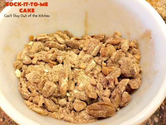 Sock-It-To-Me Cake | Can't Stay Out of the Kitchen | this fantastic #cake will knock your socks off! It has a lovely #pecan streusel filling in the middle & it's glazed with vanilla icing. We serve this as a #coffeecake for #breakfast or for #dessert. #Brunch #Holiday #cinnamon #HolidayBreakfast #SockItToMeCake 
