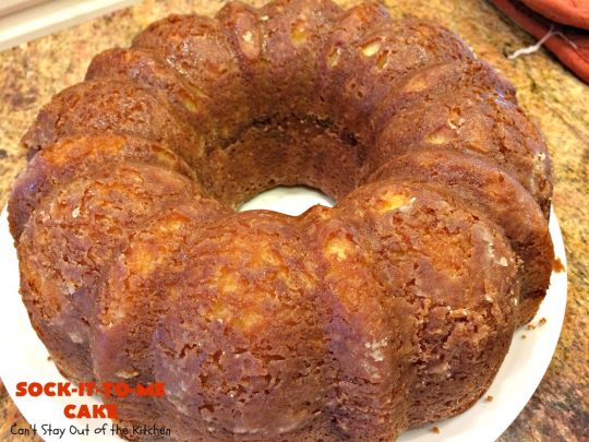 Sock-It-To-Me Cake | Can't Stay Out of the Kitchen | this fantastic #cake will knock your socks off! It has a lovely #pecan streusel filling in the middle & it's glazed with vanilla icing. We serve this as a #coffeecake for #breakfast or for #dessert. #Brunch #Holiday #cinnamon #HolidayBreakfast #SockItToMeCake 