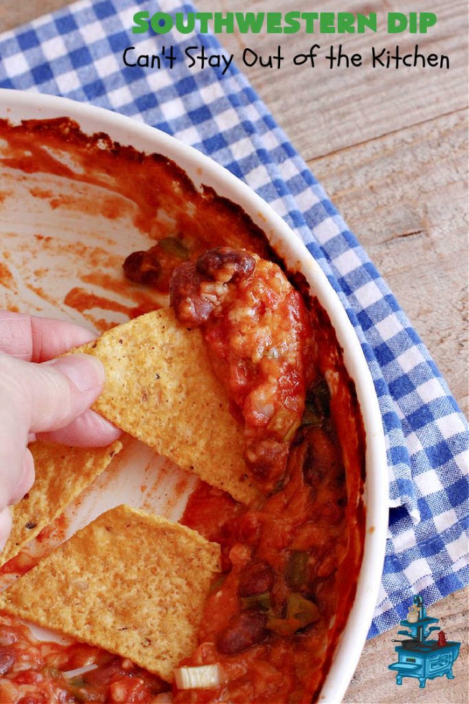 Southwestern Dip | Can't Stay Out of the Kitchen | this fantastic #TexMex #appetizer is quick & easy to make up. It's terrific to serve for #tailgating or office parties, potlucks or summer #holiday fun like #CincoDeMayo, #FourthOfJuly or #LaborDay. Serve with #Fritos or #TortillaChips. Every bite will knock your socks off! #GlutenFree #MontereyJackCheese #ChiliWithBeans #GreenChilies #TexMexDip #SouthwesternDip #TexMexAppetizer