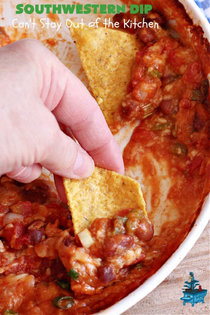 Southwestern Dip | Can't Stay Out of the Kitchen | this fantastic #TexMex #appetizer is quick & easy to make up. It's terrific to serve for #tailgating or office parties, potlucks or summer #holiday fun like #CincoDeMayo, #FourthOfJuly or #LaborDay. Serve with #Fritos or #TortillaChips. Every bite will knock your socks off! #GlutenFree #MontereyJackCheese #ChiliWithBeans #GreenChilies #TexMexDip #SouthwesternDip #TexMexAppetizer