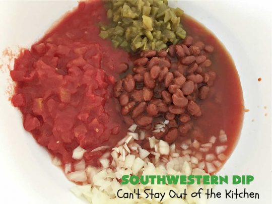 Southwestern Dip | Can't Stay Out of the Kitchen | this fantastic #TexMex #appetizer is quick & easy to make up. It's terrific to serve for #tailgating or office parties, potlucks or summer #holiday fun like #CincoDeMayo, #FourthOfJuly or #LaborDay. Serve with #Fritos or #TortillaChips. Every bite will knock your socks off! #GlutenFree #MontereyJackCheese #ChiliWithBeans #GreenChilies #TexMexDip #SouthwesternDip #TexMexAppetizer