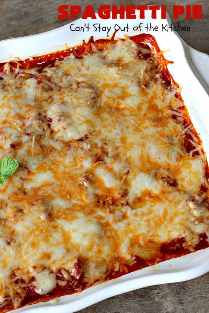 Spaghetti Pie | Can't Stay Out of the Kitchen | this kid-friendly #pasta #recipe has been a family favorite for years. This version uses a "crust" of #spaghetti, eggs, butter & #parmesancheese. It's topped with #groundbeef, then #Ricottacheese, then #mozzarella #cheese. Terrific for company since it makes a lot! You can also make this for #MeatlessMondays by eliminating the ground #beef. #noodles