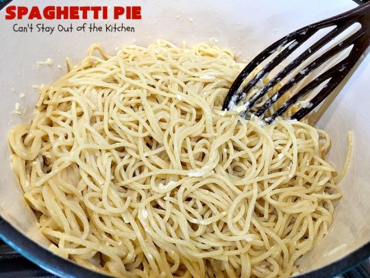 Spaghetti Pie | Can't Stay Out of the Kitchen | this kid-friendly #pasta #recipe has been a family favorite for years. This version uses a "crust" of #spaghetti, eggs, butter & #parmesancheese. It's topped with #groundbeef, then #Ricottacheese, then #mozzarella #cheese. Terrific for company since it makes a lot! You can also make this for #MeatlessMondays by eliminating the ground #beef. #noodles