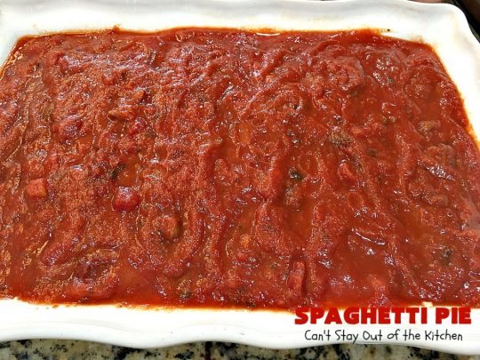 Spaghetti Pie | Can't Stay Out of the Kitchen | this kid-friendly #pasta #recipe has been a family favorite for years. This version uses a "crust" of #spaghetti, eggs, butter & #parmesancheese. It's topped with #groundbeef, then #Ricottacheese, then #mozzarella #cheese. Terrific for company since it makes a lot! You can also make this for #MeatlessMondays by eliminating the ground #beef. #noodles