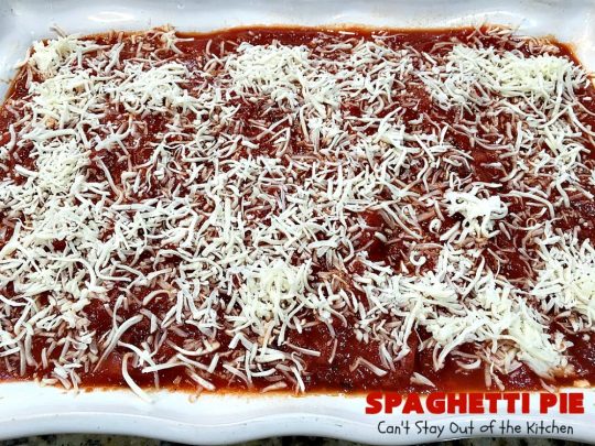 Spaghetti Pie | Can't Stay Out of the Kitchen | this kid-friendly #pasta #recipe has been a family favorite for years. This version uses a "crust" of #spaghetti, eggs, butter & #parmesancheese. It's topped with #groundbeef, then #Ricottacheese, then #mozzarella #cheese. Terrific for company since it makes a lot! You can also make this for #MeatlessMondays by eliminating the ground #beef. #noodles