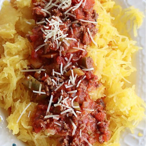 Spaghetti Squash with Italian Sausage | Can't Stay Out of the Kitchen | this delicious entree is terrific for those looking for tasty #LowCalorie meals. #SpaghettiSquash is substituted for regular #pasta in this #healthy version of a family favorite. Delicious way to enjoy #spaghetti but without all the #calories & #carbs. #ItalianSausage #GroundBeef #tomatoes #GlutenFree #SpaghettiSquashWithItalianSausage