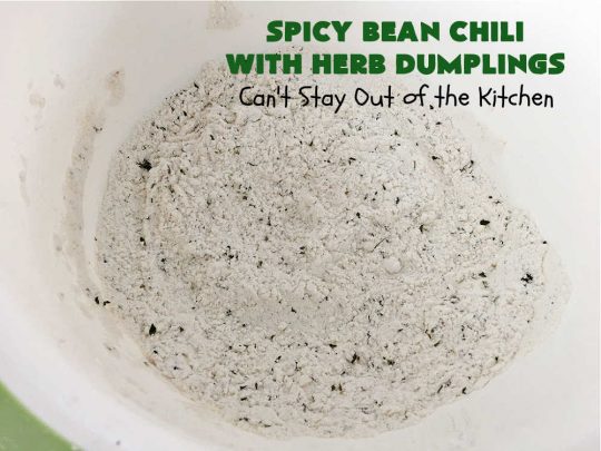 Spicy Bean Chili with Herb Dumplings | Can't Stay Out of the Kitchen | this fantastic #chili #recipe includes 4 kinds of #beans, #ChipotlePeppers in #AdoboSauce & #GreenChilies to make it sizzle. The #HerbDumplings are light & airy & add mouthwatering goodness to every bite. This #GlutenFree entree is wonderful reheated too. #BlackBeans #beef #KidneyBeans #ChiliBeans #corn #dumplings #SpicyBeanChili #SpicyBeanChiliWithHerbDumplings #TexMex