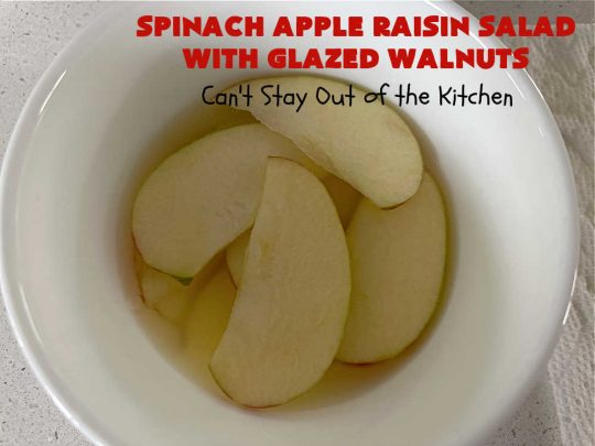 Spinach Apple Raisin Salad with Glazed Walnuts | Can't Stay Out of the Kitchen | this elegant & beautiful #salad looks like a lot of work but it can be whipped up in about 15 minutes--including the #SaladDressing! The flavors are wonderful together making it perfect for a company #salad or #holidays. Add #GrilledChicken or #GrilledSalmon for a main dish meal. #FetaCheese #raisins #apples #walnuts #TossedSalad #SpinachAppleRaisinSaladWithGlazedWalnuts