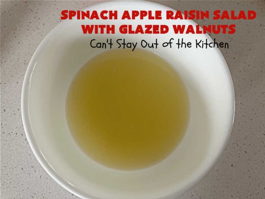 Spinach Apple Raisin Salad with Glazed Walnuts | Can't Stay Out of the Kitchen | this elegant & beautiful #salad looks like a lot of work but it can be whipped up in about 15 minutes--including the #SaladDressing! The flavors are wonderful together making it perfect for a company #salad or #holidays. Add #GrilledChicken or #GrilledSalmon for a main dish meal. #FetaCheese #raisins #apples #walnuts #TossedSalad #SpinachAppleRaisinSaladWithGlazedWalnuts