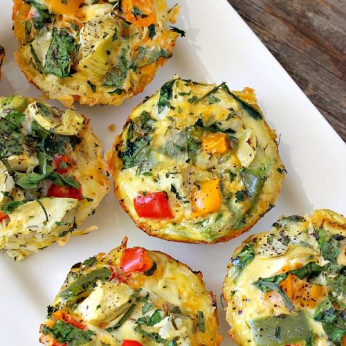 Spinach Artichoke Breakfast Muffins | Can't Stay Out of the Kitchen | these vegetarian #breakfast #muffins are fantastic. Fresh #spinach and #artichokes are combined with eggs and #cheddarcheese in a hash brown #potato crust. Perfect for any #holiday breakfast. #glutenfree