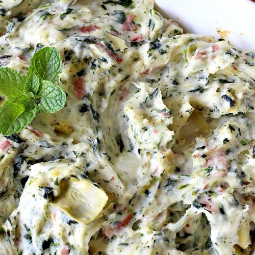 Spinach Artichoke Mashed Potatoes | Can't Stay Out of the Kitchen | this is a dynamic way to eat #mashedpotatoes. This one includes #creamcheese and sour cream along with #spinach, #artichokes & roasted #garlic. It's a terrific #sidedish for any meal but particularly delightful for company & #holidays like #Thanksgiving or #Christmas. #glutenfree