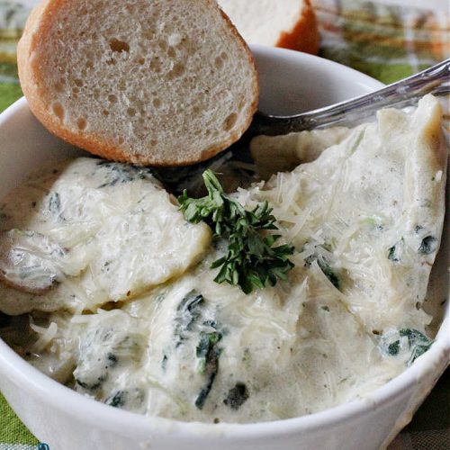 Spinach Mushroom Ravioli | Can't Stay Out of the Kitchen | This #MeatlessMonday #recipe can be dinner ready in less than 30 minutes! It's totally mouthwatering & irresistible. This fabulous #pasta dish is filled with three #cheeses, #spinach and two kinds of #mushrooms in a #garlic #AlfredoSauce that's succulent and amazing. #ravioli #SpinachMushroomRavioli