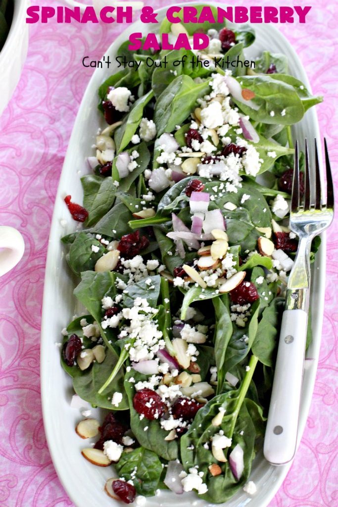 Spinach and Cranberry Salad | Can't Stay Out of the Kitchen | this lovely #salad has a delightful #Orange #Vinaigrette that makes it snap. It's terrific for company or #holidays like #MothersDay or #FathersDay. It's quick & easy & uses only 8 ingredients. #spinach #cranberries #Craisins #almonds #GlutenFree #HolidaySideDish #MothersDaySideDish #FathersDaySideDish #SpinachAndCranberrySalad