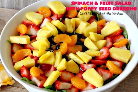 Spinach and Fruit Salad with Poppy Seed Dressing | this is one of our favorite #salad #recipes. It's filled with #strawberries, #Blueberries, #pineapple & #MandarinOranges. It also has #Cashews & #SwissCheese. No one can resist this amazing #TossedSalad! We serve it for company all the time. #holiday #HolidaySalad #TossedSaladWithFruit #SpinachSalad #SpinachAndFruitSaladWithPoppySeedDressing #PoppySeedDressing #GlutenFree #Healthy #HealthySaladRecipe