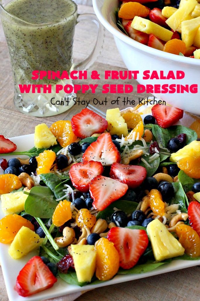 Spinach and Fruit Salad with Poppy Seed Dressing | this is one of our favorite #salad #recipes. It's filled with #strawberries, #Blueberries, #pineapple & #MandarinOranges. It also has #Cashews & #SwissCheese. No one can resist this amazing #TossedSalad! We serve it for company all the time. #holiday #HolidaySalad #TossedSaladWithFruit #SpinachSalad #SpinachAndFruitSaladWithPoppySeedDressing #PoppySeedDressing #GlutenFree #Healthy #HealthySaladRecipe