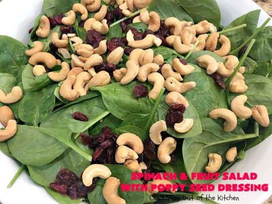 Spinach and Fruit Salad with Poppy Seed Dressing | this is one of our favorite #salad #recipes. It's filled with #strawberries, #Blueberries, #pineapple & #MandarinOranges. It also has #Cashews & #SwissCheese. No one can resist this amazing #TossedSalad! We serve it for company all the time. #holiday #HolidaySalad #TossedSaladWithFruit #SpinachSalad #SpinachAndFruitSaladWithPoppySeedDressing #PoppySeedDressing #GlutenFree #Healthy #HealthySaladRecipe