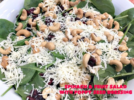 Spinach and Fruit Salad with Poppy Seed Dressing | this is one of our favorite #salad #recipes. It's filled with #strawberries, #Blueberries, #pineapple & #MandarinOranges. It also has #Cashews & #SwissCheese. No one can resist this amazing #TossedSalad! We serve it for company all the time. #holiday #HolidaySalad #TossedSaladWithFruit #SpinachSalad #SpinachAndFruitSaladWithPoppySeedDressing #PoppySeedDressing #GlutenFree #Healthy #HealthySaladRecipe