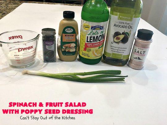 Spinach and Fruit Salad with Poppy Seed Dressing | this is one of our favorite #salad #recipes. It's filled with #strawberries, #Blueberries, #pineapple & #MandarinOranges. It also has #Cashews & #SwissCheese. No one can resist this amazing #TossedSalad! We serve it for company all the time. #holiday #HolidaySalad #TossedSaladWithFruit #SpinachSalad #SpinachAndFruitSaladWithPoppySeedDressing #PoppySeedDressing #GlutenFree #Healthy #HealthySaladRecipe