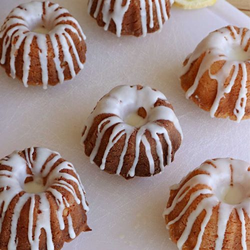 Starbucks Copycat Lemon Tea Cakes | Can't Stay Out of the Kitchen | these delicious #TeaCakes are made from a #Starbucks #CopycatRecipe for their #LemonBread. The #lemon just pops in flavor and the icing is drool-worthy. Made in individual #bundt pans, these are terrific for a weekend, company or #holiday #breakfast like #Thanksgiving, #Christmas or #NewYearsDay. #HolidayBreakfast #StarbucksCopycatLemonTeaCakes