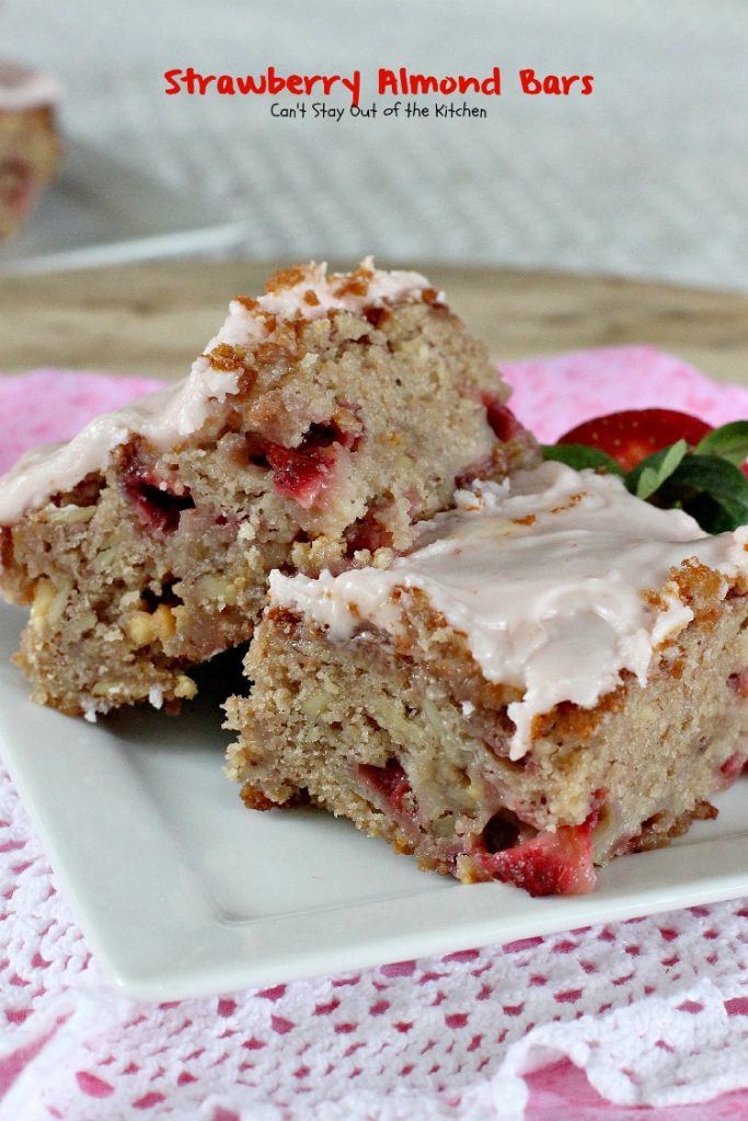 Strawberry Almond Bars | Can't Stay Out of the Kitchen | these luscious bars are made with #strawberries #almonds and #vanillachips and the icing is to die for! #dessert #cookie 