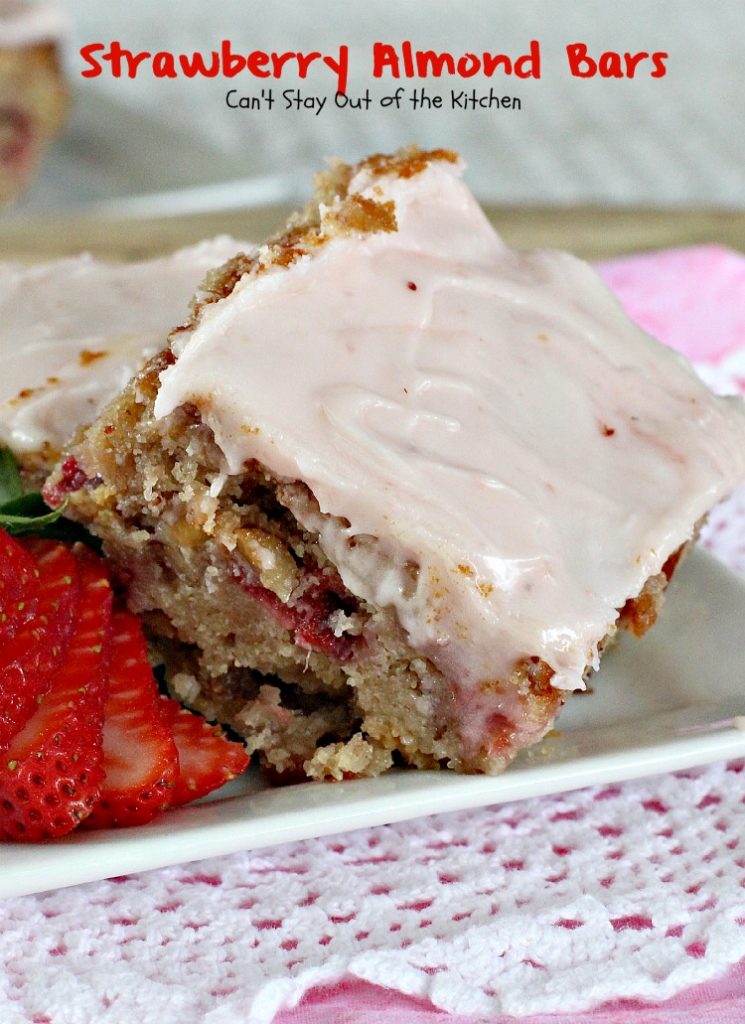 Strawberry Almond Bars | Can't Stay Out of the Kitchen | these luscious bars are made with #strawberries #almonds and #vanillachips and the icing is to die for! #dessert #cookie 