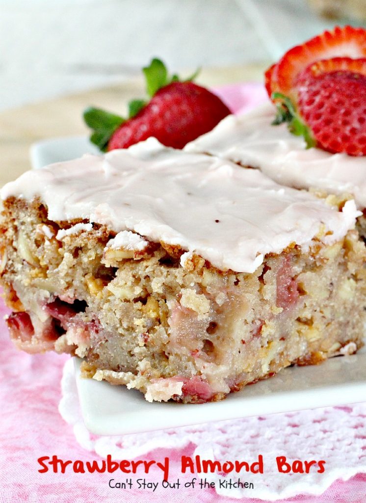 Strawberry Almond Bars | Can't Stay Out of the Kitchen | these luscious bars are made with #strawberries #almonds and #vanillachips and the icing is to die for! #dessert #cookie 
