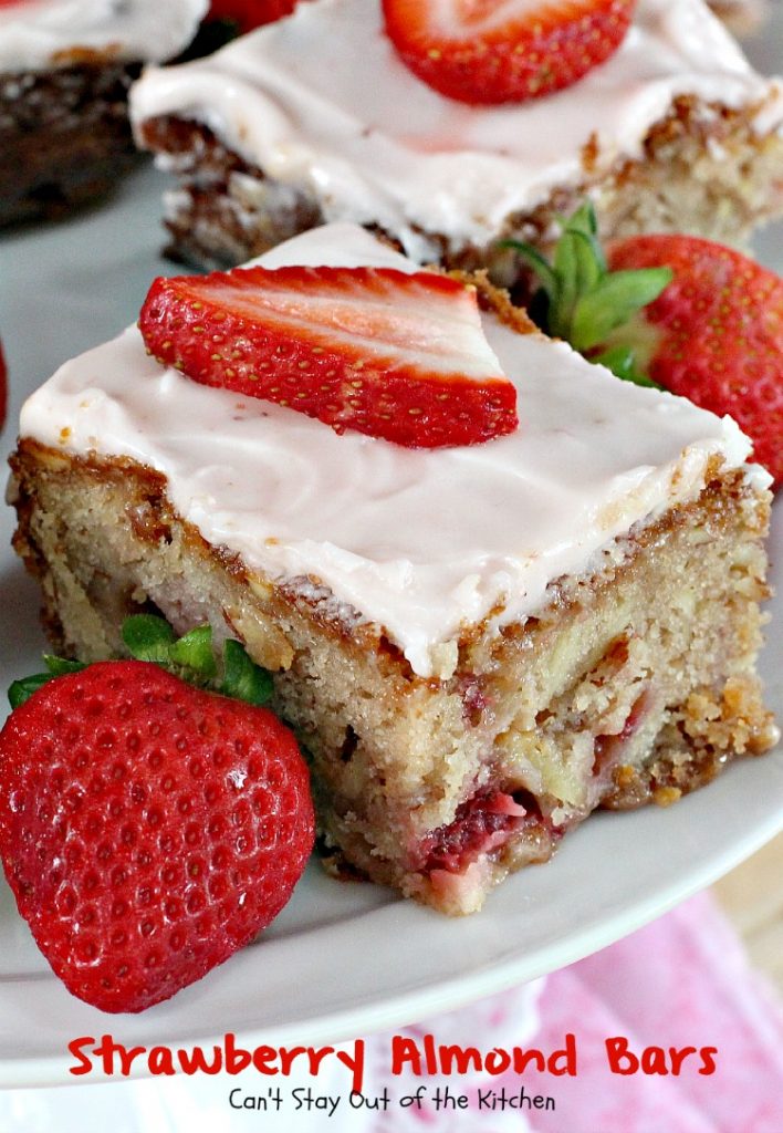 Strawberry Almond Bars | Can't Stay Out of the Kitchen | these luscious bars are made with #strawberries #almonds and #vanillachips and the icing is to die for! #dessert #cookie 