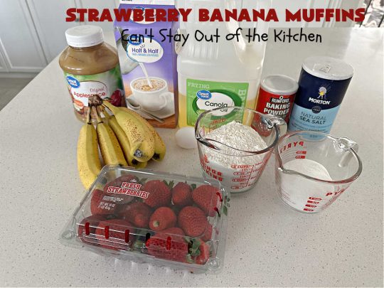 Strawberry Banana Muffins | Can't Stay Out of the Kitchen | These fantastic #strawberry #muffins include #applesauce & #bananas to keep them moist & #strawberries to provide pop in flavor & texture. Every bite will knock your socks off! Add a cup of #coffee & you're good to go! Also great for a company or #holiday #breakfast #menu. #StrawberryMuffins #StrawberryBananaMuffins