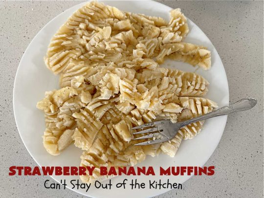 Strawberry Banana Muffins | Can't Stay Out of the Kitchen | These fantastic #strawberry #muffins include #applesauce & #bananas to keep them moist & #strawberries to provide pop in flavor & texture. Every bite will knock your socks off! Add a cup of #coffee & you're good to go! Also great for a company or #holiday #breakfast #menu. #StrawberryMuffins #StrawberryBananaMuffins