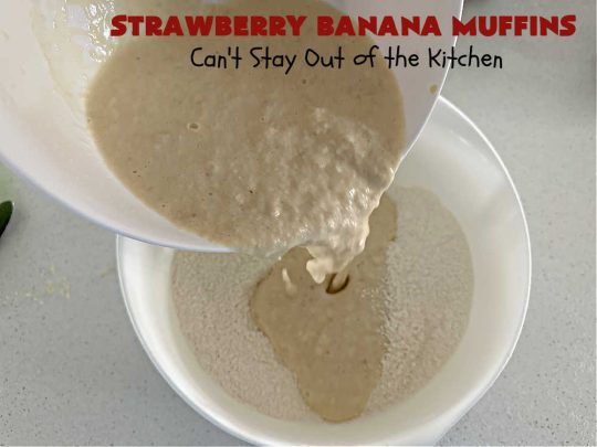 Strawberry Banana Muffins | Can't Stay Out of the Kitchen | These fantastic #strawberry #muffins include #applesauce & #bananas to keep them moist & #strawberries to provide pop in flavor & texture. Every bite will knock your socks off! Add a cup of #coffee & you're good to go! Also great for a company or #holiday #breakfast #menu. #StrawberryMuffins #StrawberryBananaMuffins