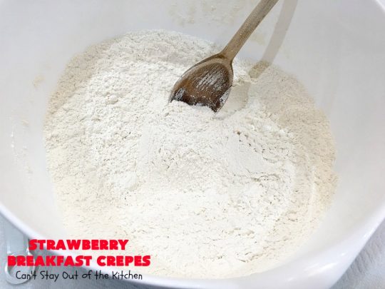 Strawberry Breakfast Crêpes | Can't Stay Out of the Kitchen | these lovely crêpes are filled with a luscious #strawberry filling. They're an excellent choice for a company or #holiday #breakfast. So rich & decadent they taste like eating #dessert! #BreakfastCrêpes #StrawberryBreakfastCrêpes