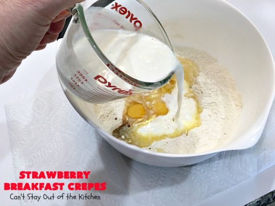 Strawberry Breakfast Crêpes | Can't Stay Out of the Kitchen | these lovely crêpes are filled with a luscious #strawberry filling. They're an excellent choice for a company or #holiday #breakfast. So rich & decadent they taste like eating #dessert! #BreakfastCrêpes #StrawberryBreakfastCrêpes