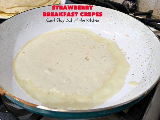 Strawberry Breakfast Crêpes | Can't Stay Out of the Kitchen | these lovely crêpes are filled with a luscious #strawberry filling. They're an excellent choice for a company or #holiday #breakfast. So rich & decadent they taste like eating #dessert! #BreakfastCrêpes #StrawberryBreakfastCrêpes