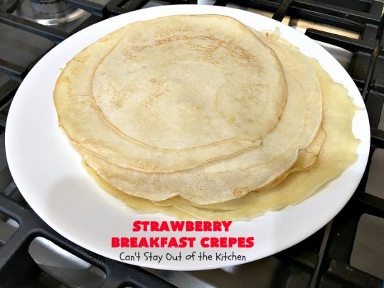 Strawberry Breakfast Crêpes | Can't Stay Out of the Kitchen | these lovely crêpes are filled with a luscious #strawberry filling. They're an excellent choice for a company or #holiday #breakfast. So rich & decadent they taste like eating #dessert! #BreakfastCrêpes #StrawberryBreakfastCrêpes