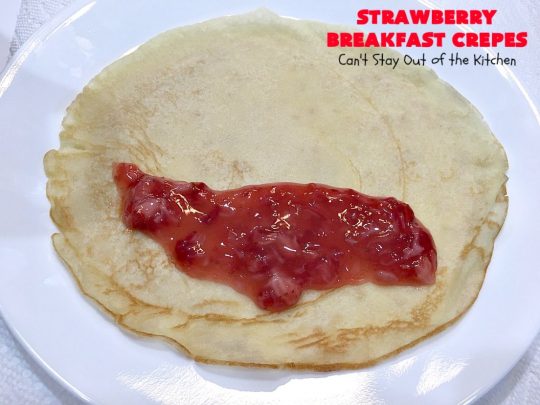 Strawberry Breakfast Crêpes | Can't Stay Out of the Kitchen | these lovely crêpes are filled with a luscious #strawberry filling. They're an excellent choice for a company or #holiday #breakfast. So rich & decadent they taste like eating #dessert! #BreakfastCrêpes #StrawberryBreakfastCrêpes
