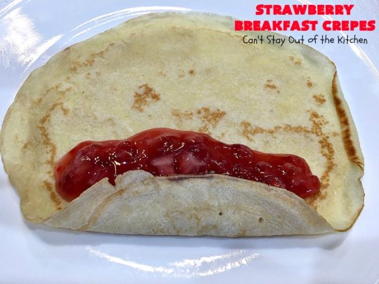 Strawberry Breakfast Crêpes | Can't Stay Out of the Kitchen | these lovely crêpes are filled with a luscious #strawberry filling. They're an excellent choice for a company or #holiday #breakfast. So rich & decadent they taste like eating #dessert! #BreakfastCrêpes #StrawberryBreakfastCrêpes