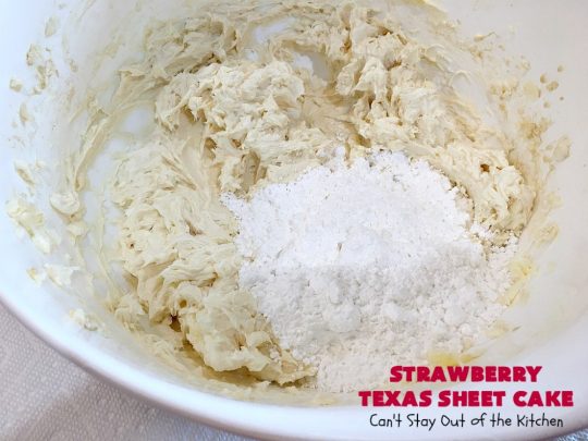 Strawberry Texas Sheet Cake | Can't Stay Out of the Kitchen | this amazing #dessert will have you drooling from the first bite! The #CreamCheese icing is fantastic. Perfect #cake for company or #holidays because it feeds a crowd and everyone wants seconds! #SheetCake #TexasSheetCake #strawberries #StrawberryTexasSheetCake #HolidayDessert #Christmas #ValentinesDay