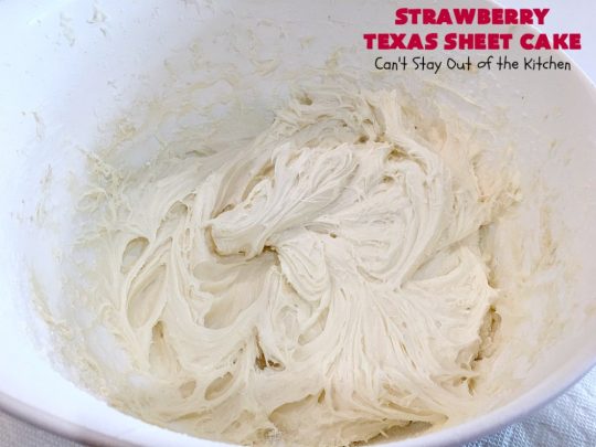 Strawberry Texas Sheet Cake | Can't Stay Out of the Kitchen | this amazing #dessert will have you drooling from the first bite! The #CreamCheese icing is fantastic. Perfect #cake for company or #holidays because it feeds a crowd and everyone wants seconds! #SheetCake #TexasSheetCake #strawberries #StrawberryTexasSheetCake #HolidayDessert #Christmas #ValentinesDay