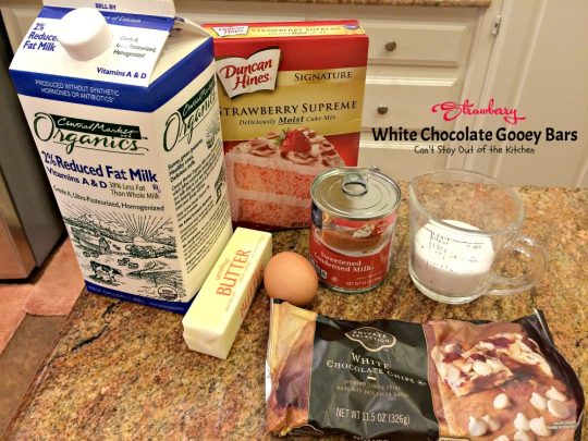 Strawberry White Chocolate Gooey Bars | Can't Stay Out of the Kitchen | these incredibly gooey #brownies are so easy & delicious. They start with a #strawberry #cakemix & are filled with #whitechocolatechips & sweetened #condensedmilk. #dessert #cookie #chocolate