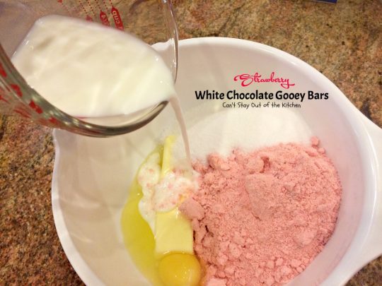 Strawberry White Chocolate Gooey Bars | Can't Stay Out of the Kitchen | these incredibly gooey #brownies are so easy & delicious. They start with a #strawberry #cakemix & are filled with #whitechocolatechips & sweetened #condensedmilk. #dessert #cookie #chocolate