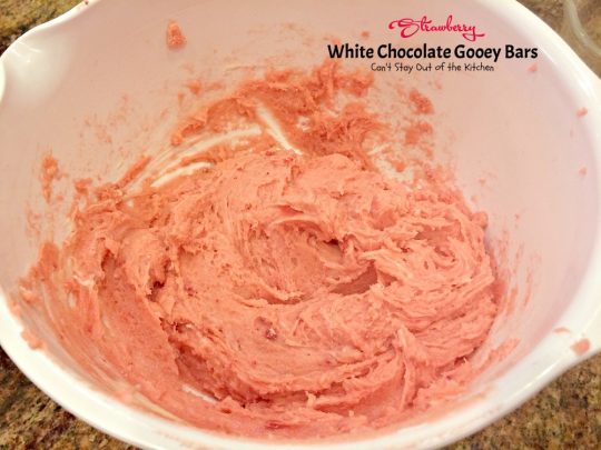 Strawberry White Chocolate Gooey Bars | Can't Stay Out of the Kitchen | these incredibly gooey #brownies are so easy & delicious. They start with a #strawberry #cakemix & are filled with #whitechocolatechips & sweetened #condensedmilk. #dessert #cookie #chocolate
