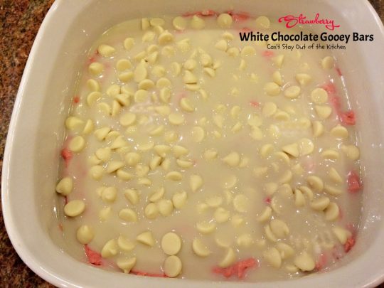 Strawberry White Chocolate Gooey Bars | Can't Stay Out of the Kitchen | these incredibly gooey #brownies are so easy & delicious. They start with a #strawberry #cakemix & are filled with #whitechocolatechips & sweetened #condensedmilk. #dessert #cookie #chocolate