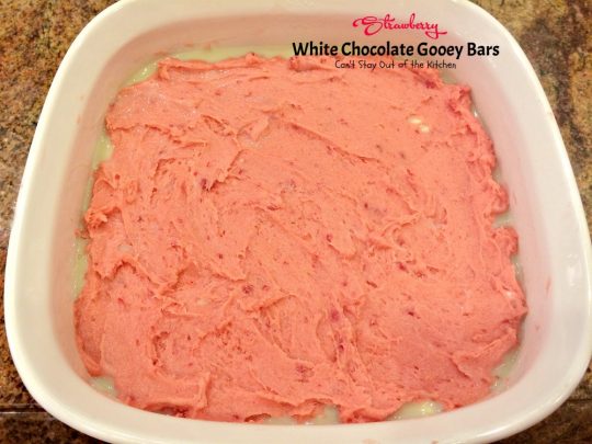 Strawberry White Chocolate Gooey Bars | Can't Stay Out of the Kitchen | these incredibly gooey #brownies are so easy & delicious. They start with a #strawberry #cakemix & are filled with #whitechocolatechips & sweetened #condensedmilk. #dessert #cookie #chocolate