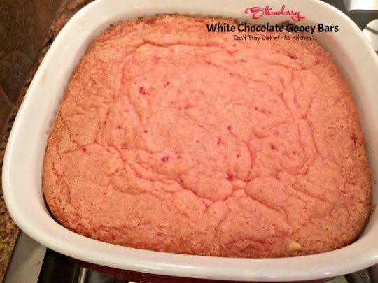 Strawberry White Chocolate Gooey Bars | Can't Stay Out of the Kitchen | these incredibly gooey #brownies are so easy & delicious. They start with a #strawberry #cakemix & are filled with #whitechocolatechips & sweetened #condensedmilk. #dessert #cookie #chocolate