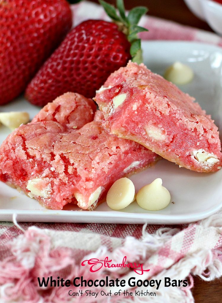 Strawberry White Chocolate Gooey Bars | Can't Stay Out of the Kitchen | these incredibly gooey #brownies are so easy & delicious. They start with a #strawberry #cakemix & are filled with #whitechocolatechips & sweetened #condensedmilk. #dessert #cookie #chocolate