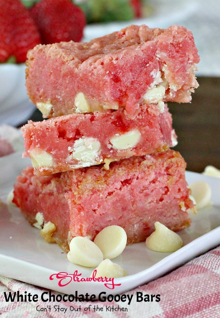 Strawberry White Chocolate Gooey Bars | Can't Stay Out of the Kitchen | these incredibly gooey #brownies are so easy & delicious. They start with a #strawberry #cakemix & are filled with #whitechocolatechips & sweetened #condensedmilk. #dessert #cookie #chocolate