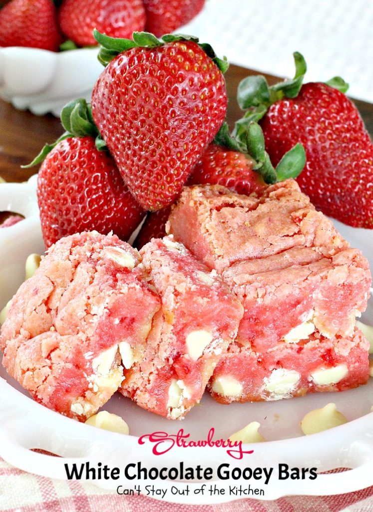 Strawberry White Chocolate Gooey Bars | Can't Stay Out of the Kitchen | these incredibly gooey #brownies are so easy & delicious. They start with a #strawberry #cakemix & are filled with #whitechocolatechips & sweetened #condensedmilk. #dessert #cookie #chocolate