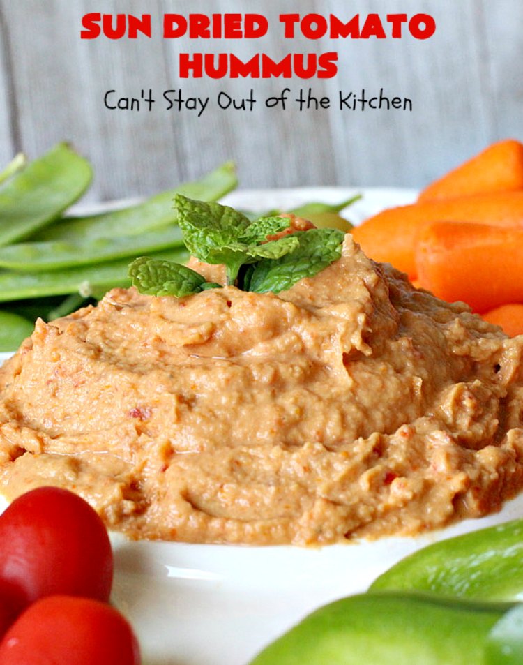 Sun Dried Tomato Hummus | Can't Stay Out of the Kitchen | this #hummus #recipe is fantastic! It includes #SunDriedTomatoes & just a little heat from cayenne pepper. This amazing #appetizer is healthy, low calorie, #GlutenFree & #vegan. Plus it can be whipped up in about 5 minutes! #tailgating #GarbanzoBeans #SunDriedTomatoHummus