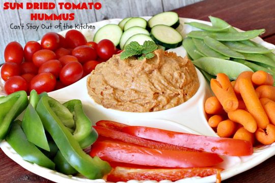 Sun Dried Tomato Hummus | Can't Stay Out of the Kitchen | this #hummus #recipe is fantastic! It includes #SunDriedTomatoes & just a little heat from cayenne pepper. This amazing #appetizer is healthy, low calorie, #GlutenFree & #vegan. Plus it can be whipped up in about 5 minutes! #tailgating #GarbanzoBeans #SunDriedTomatoHummus